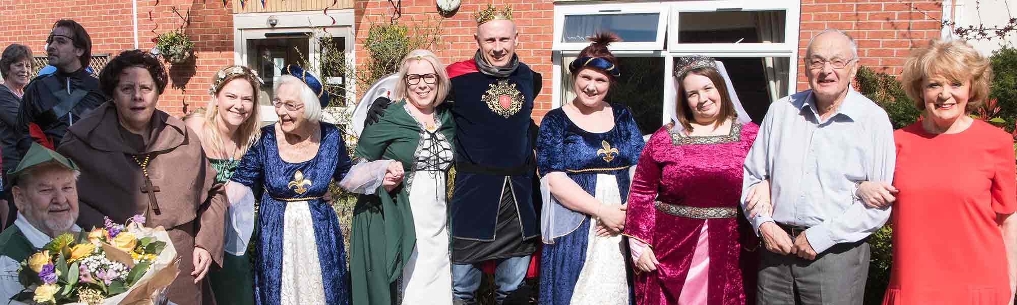 Alder House Care Home Nottingham Medieval Open Day with Sherrie Hewson staff Robin Hood banner hero