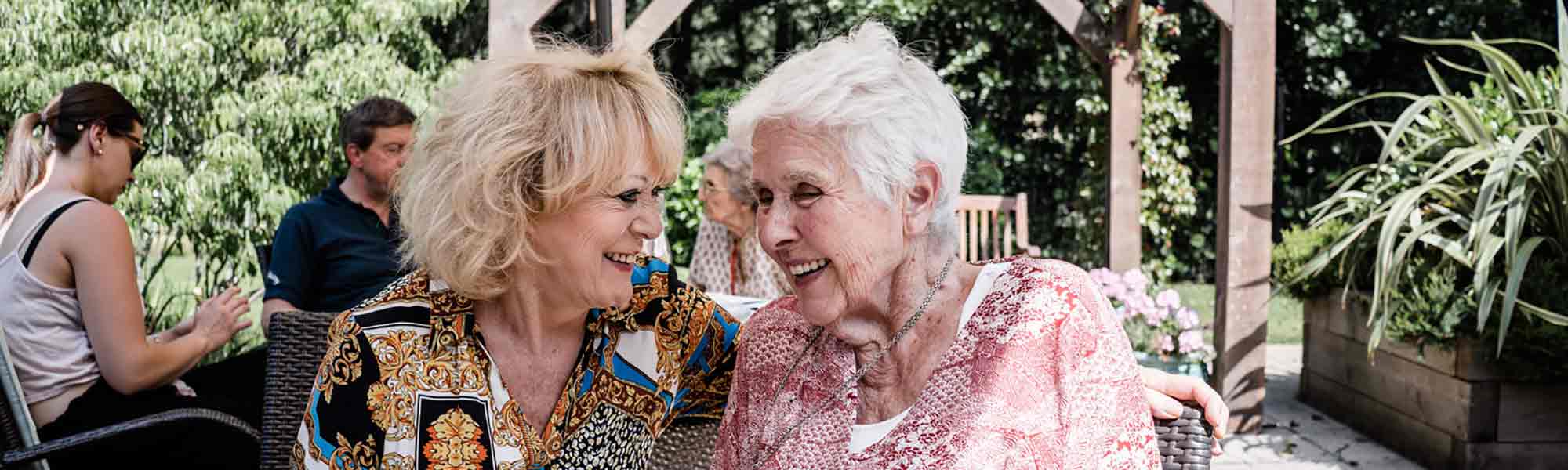 Sherrie and resident at Silvermere afternoon tea banner hero