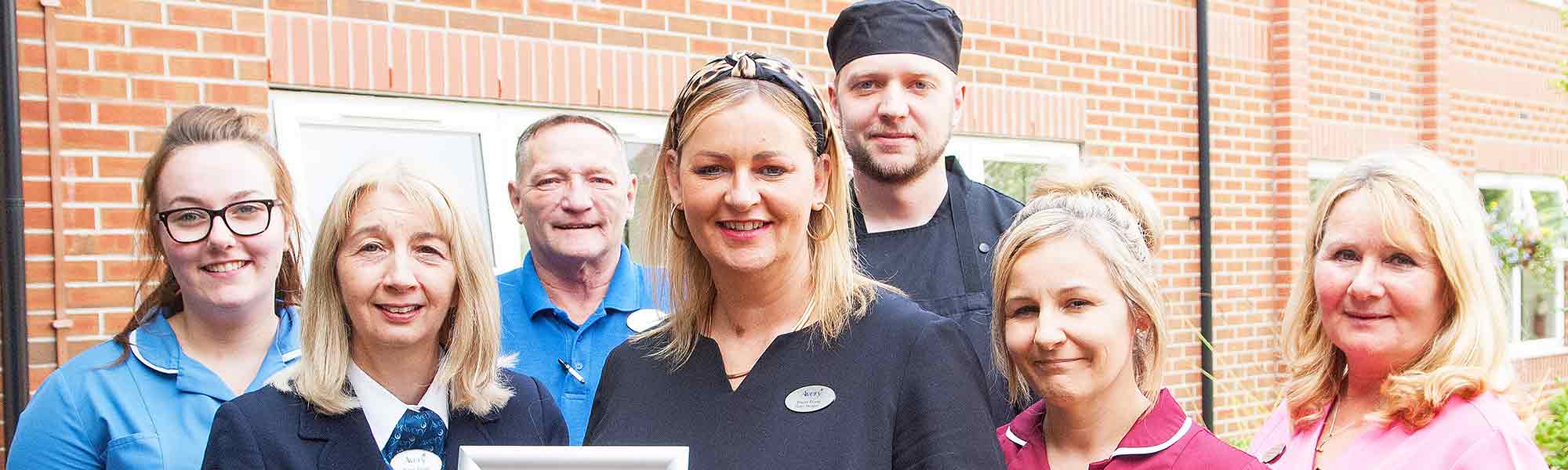 Staff celebrate CQC result August 2019 banner hero image