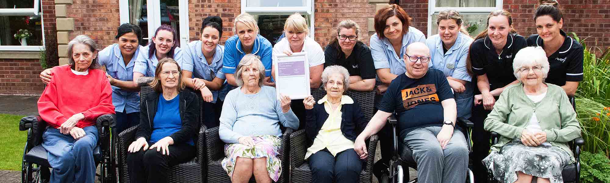 Staff and residents celebrate CQC Good In All Categories August 2019 banner hero